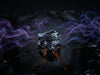 Detailed sterling silver statement ring featuring a dragon design on an obsidian base with stylized lighting.