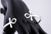 “925 sterling silver Ankh cuff bracelet on a black mannequin hand”