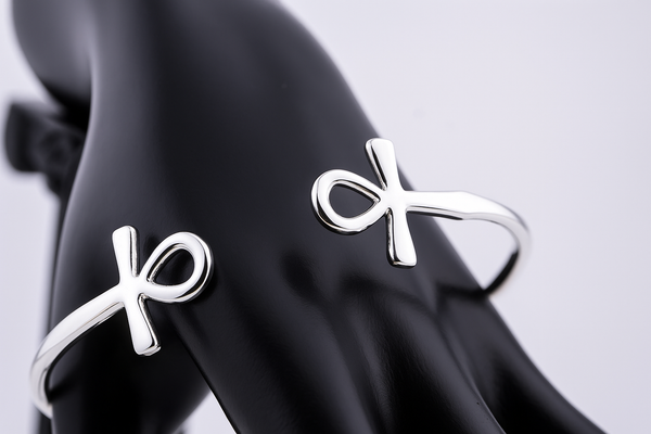 “925 sterling silver Ankh cuff bracelet on a black mannequin hand”