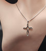 Faith Hope Love 925 sterling silver cross necklace displayed on a jewelry bust.