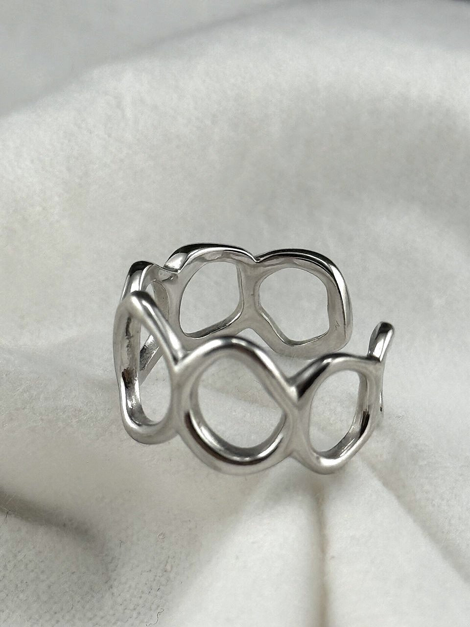 Flowing Circle adjustable sterling silver ring with polished openwork design