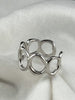 Flowing Circle adjustable sterling silver ring with polished openwork design