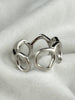 Close-up of Flowing Circle ring showing the 925 sterling silver hallmark