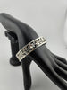 "925 sterling silver floral vine cuff bracelet displayed on black mannequin hand — Lakseena Jewelry"