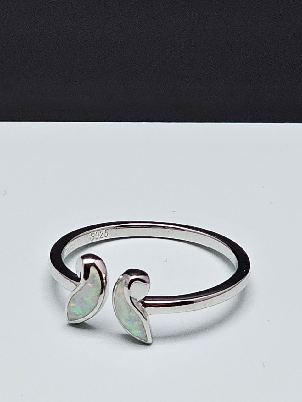 925 sterling silver adjustable open ring with two iridescent opal inlays and visible S925 hallmark.