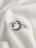 Front view of sterling silver crescent moon and stars ring with colorful opal inlay