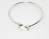 “Silver Cat Bracelet – top view of 925 sterling silver open cuff with twin cat head details on a clean white background”