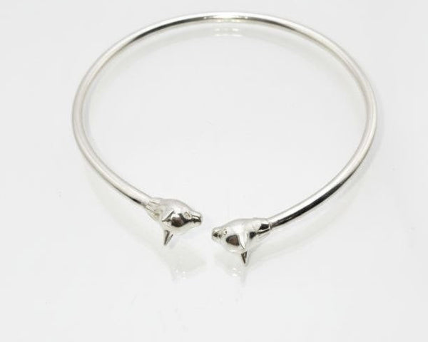 “Silver Cat Bracelet – top view of 925 sterling silver open cuff with twin cat head details on a clean white background”