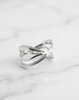 Minimalist 925 sterling silver ring with intertwined bands, high-polish finish, Lakseena jewelry.