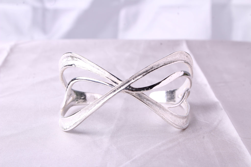 Front view of Wave silver cuff bracelet showing intricate fluid design and high precision 3D printed details